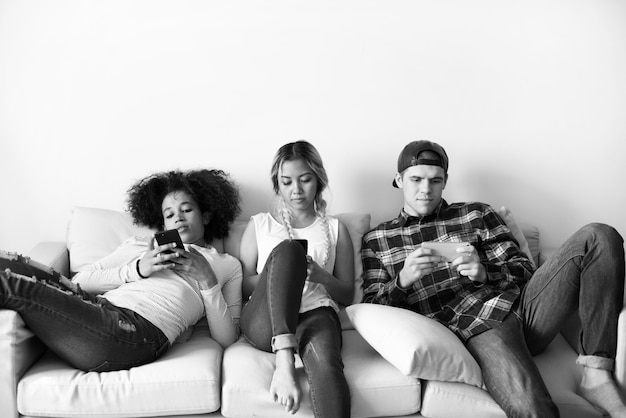 Free photo expressionless smartphone addicts