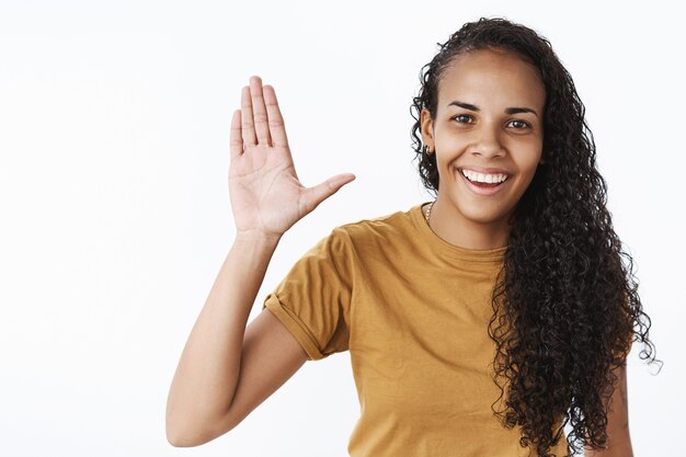 Expressive African-American girl in brown Tshirt