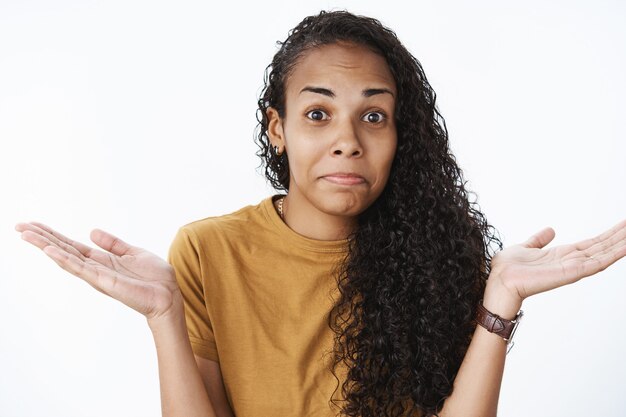 Expressive African-American girl in brown Tshirt