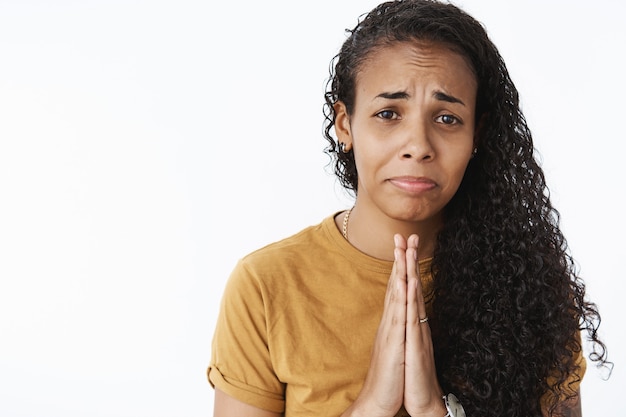 Expressive African-American girl in brown Tshirt