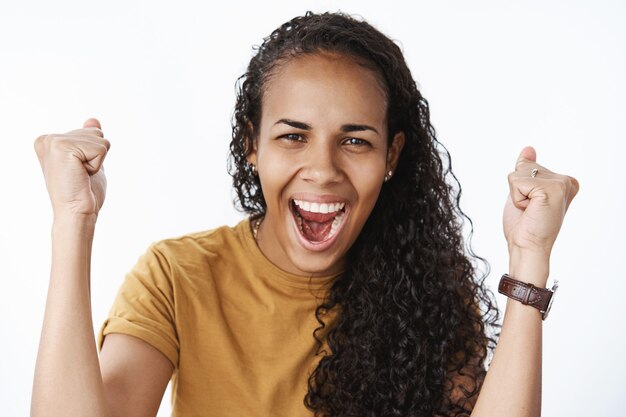 Expressive African-American girl in brown Tshirt