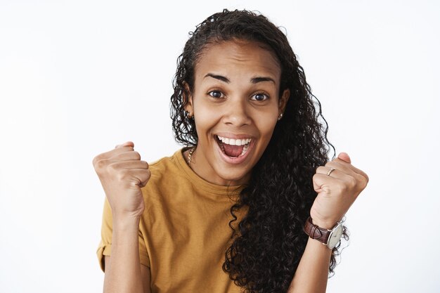 Expressive African-American girl in brown Tshirt