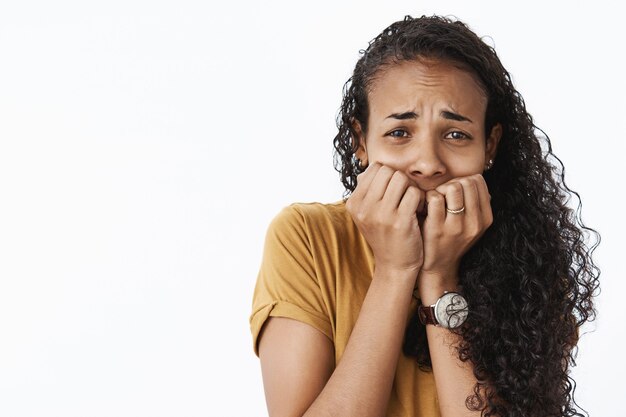 Expressive African-American girl in brown Tshirt