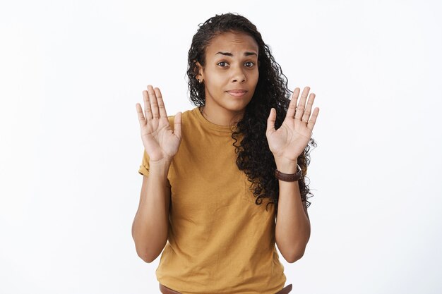 Expressive African-American girl in brown Tshirt