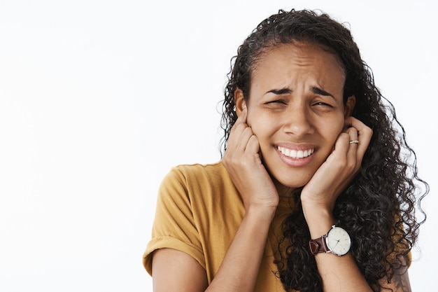 Expressive African-American girl in brown Tshirt