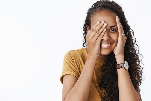 Expressive African-American girl in brown Tshirt