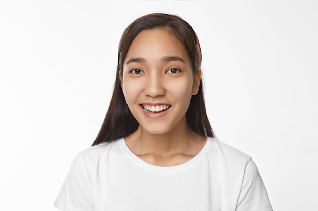 Expressive Asian girl posing indoor