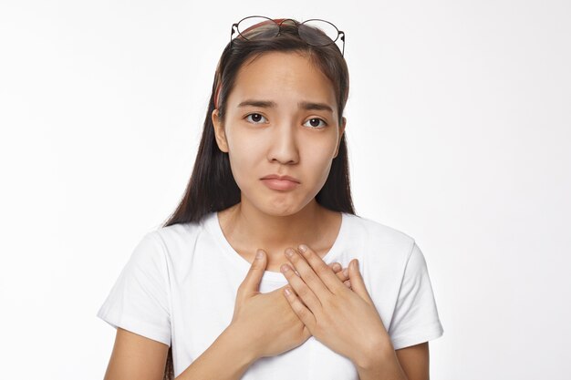 Expressive Asian girl posing indoor