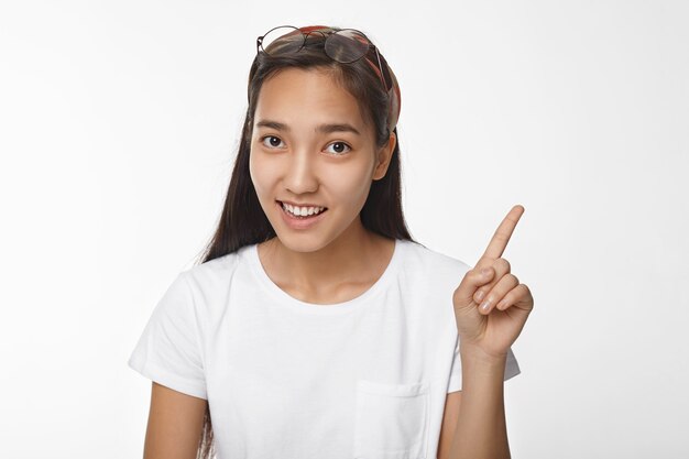 Expressive Asian girl posing indoor