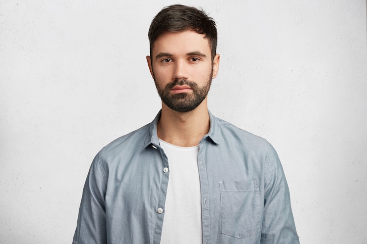 Free Photo expressive bearded man wearing shirt