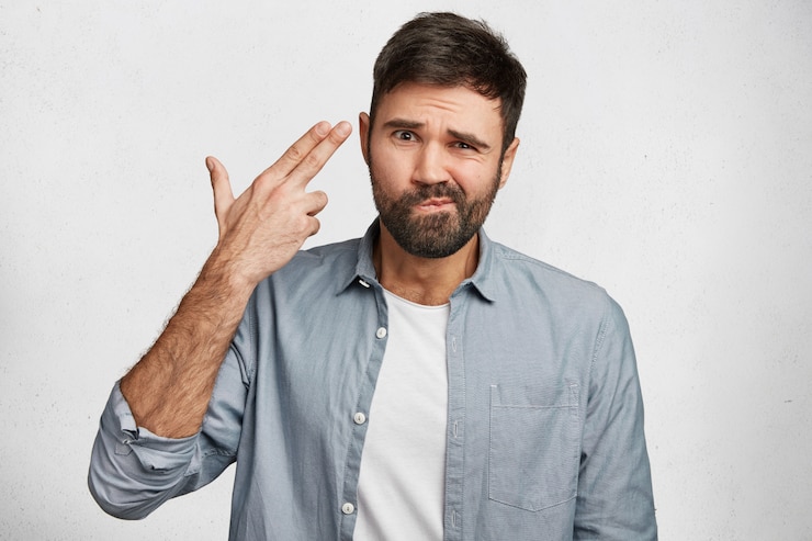 Free Photo expressive bearded man wearing shirt