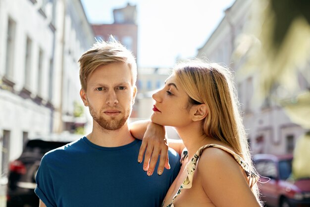 Expressive couple posing in the city