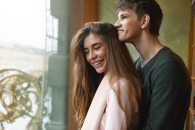 Expressive couple posing indoor