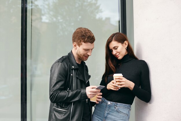 Expressive couple posing outdoor