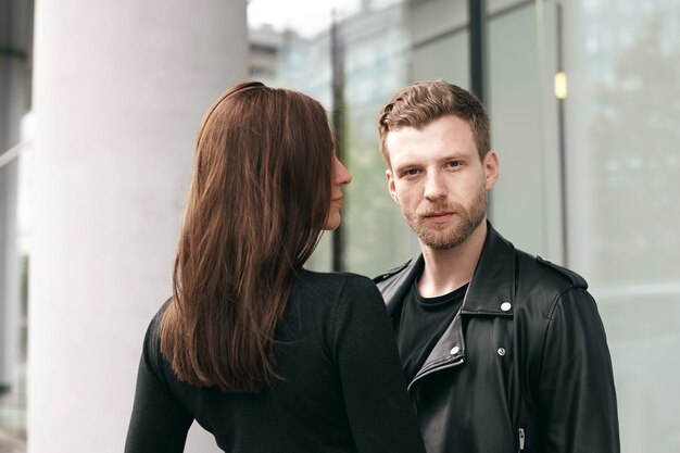 Expressive couple posing outdoor