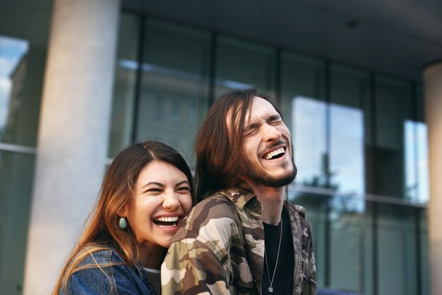 Expressive couple posing outdoor