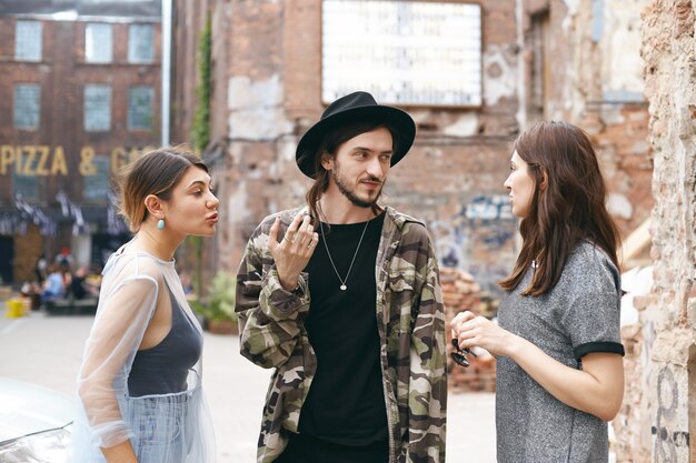 Expressive friends posing outdoor