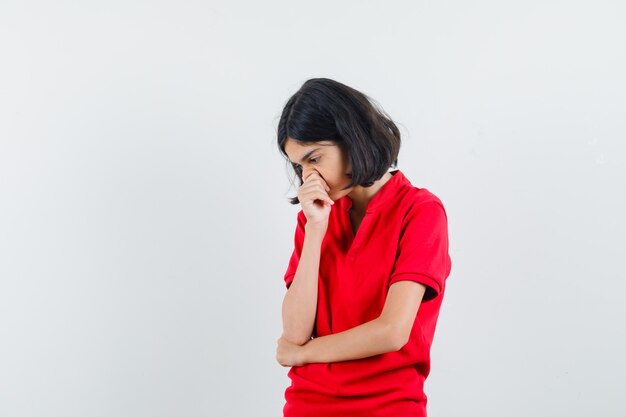 An expressive girl is posing in the studio