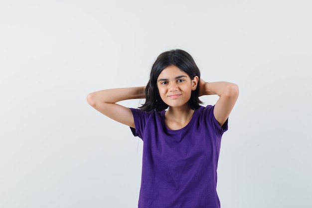 An expressive girl is posing in the studio