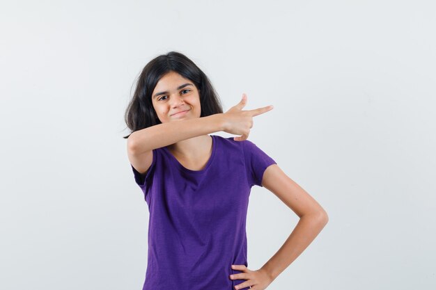 An expressive girl is posing in the studio