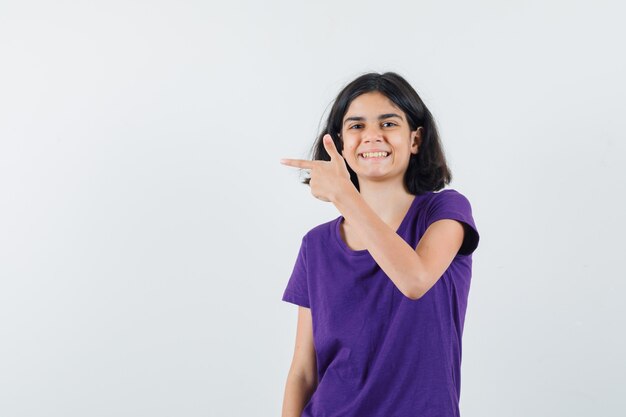 An expressive girl is posing in the studio
