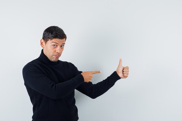 An expressive man is posing in the studio