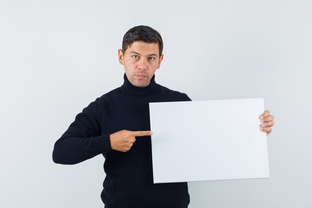 An expressive man is posing in the studio