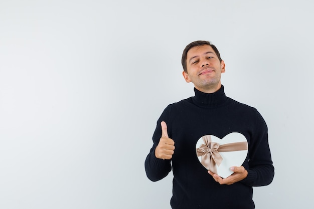 An expressive man is posing in the studio