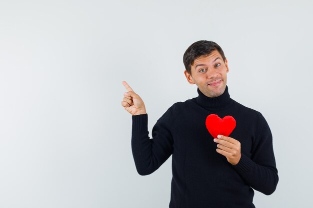 An expressive man is posing in the studio