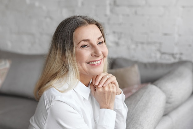 Expressive middle aged woman posing