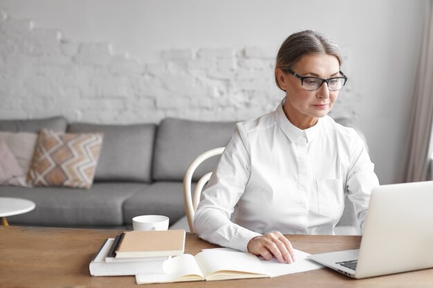 Expressive middle aged woman posing