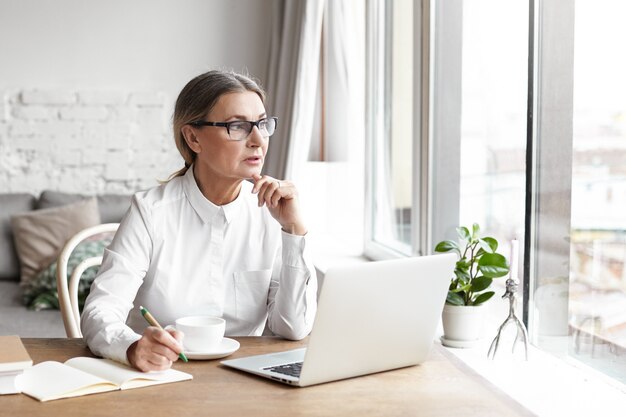 Expressive middle aged woman posing