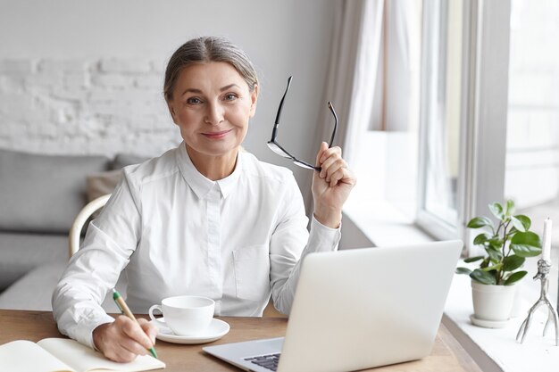 Expressive middle aged woman posing