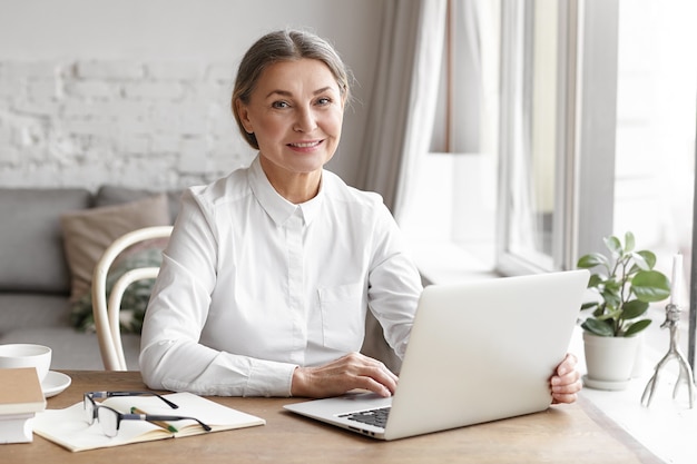 Expressive middle aged woman posing