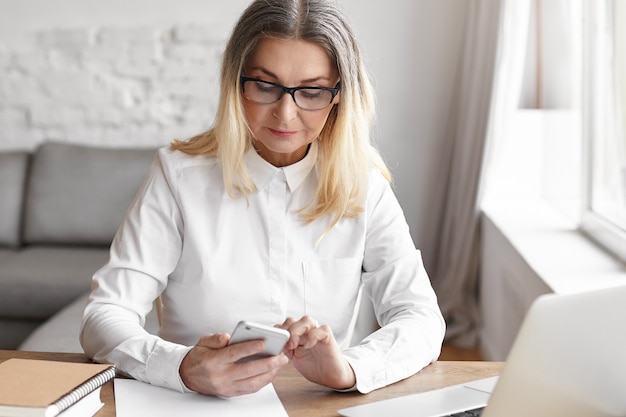 Expressive middle aged woman posing