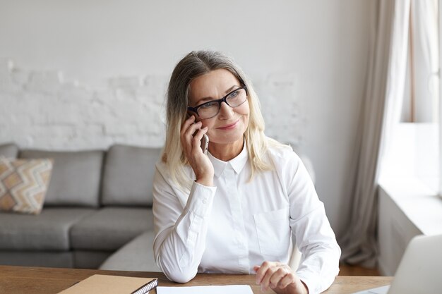 Expressive middle aged woman posing