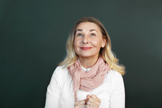 Expressive middle aged woman posing