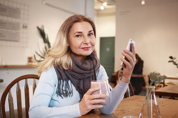 Expressive middle aged woman posing