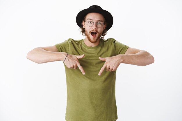 Expressive redhead bearded man with a hat