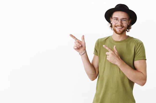 Expressive redhead bearded man with a hat