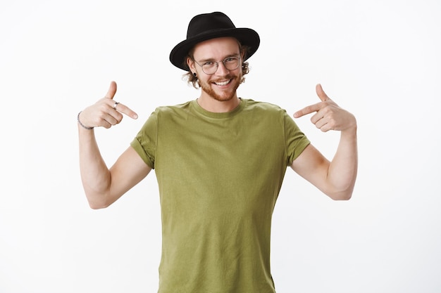 Expressive redhead bearded man with a hat