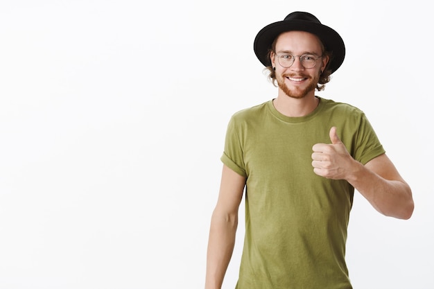 Expressive redhead bearded man with a hat