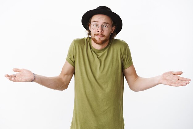 Expressive redhead bearded man with a hat