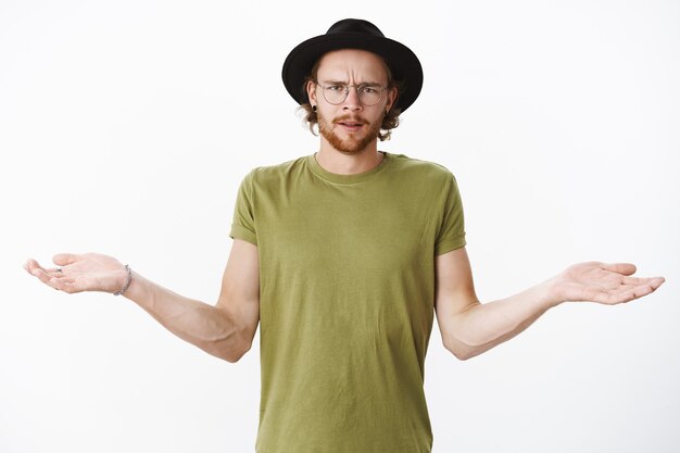 Expressive redhead bearded man with a hat