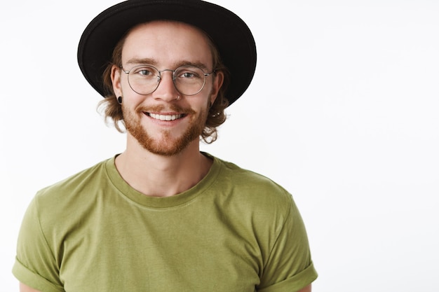 Expressive redhead bearded man with a hat