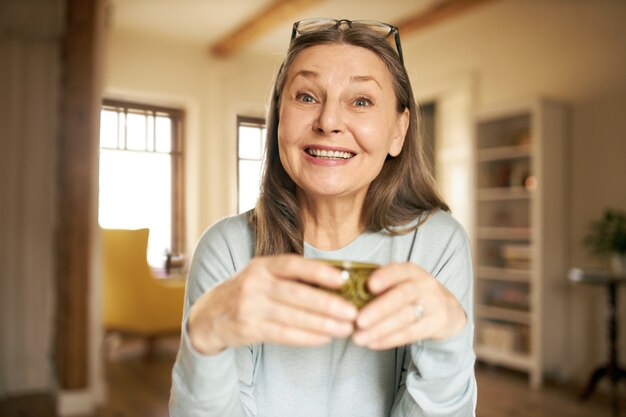 Expressive senior female posing indoor