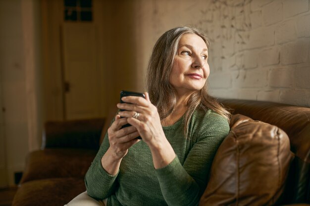 Expressive senior female posing indoor