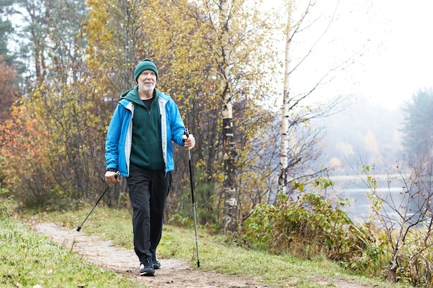 Expressive senior man posing outdoor