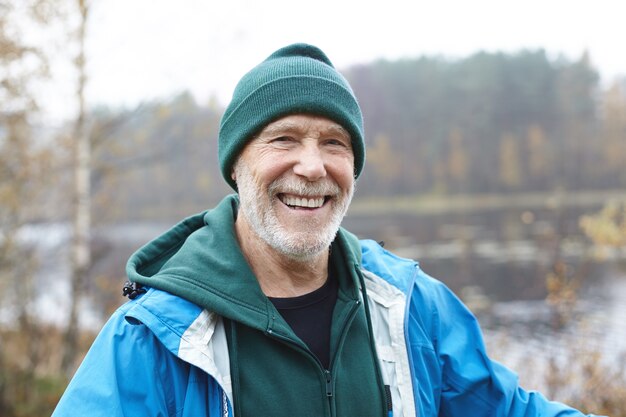 Expressive senior man posing outdoor