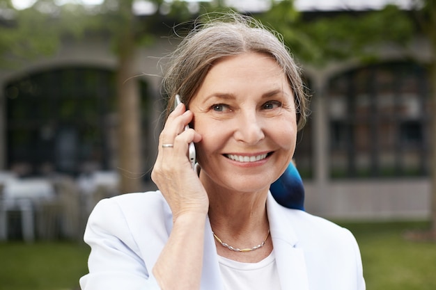 Expressive senior woman posing